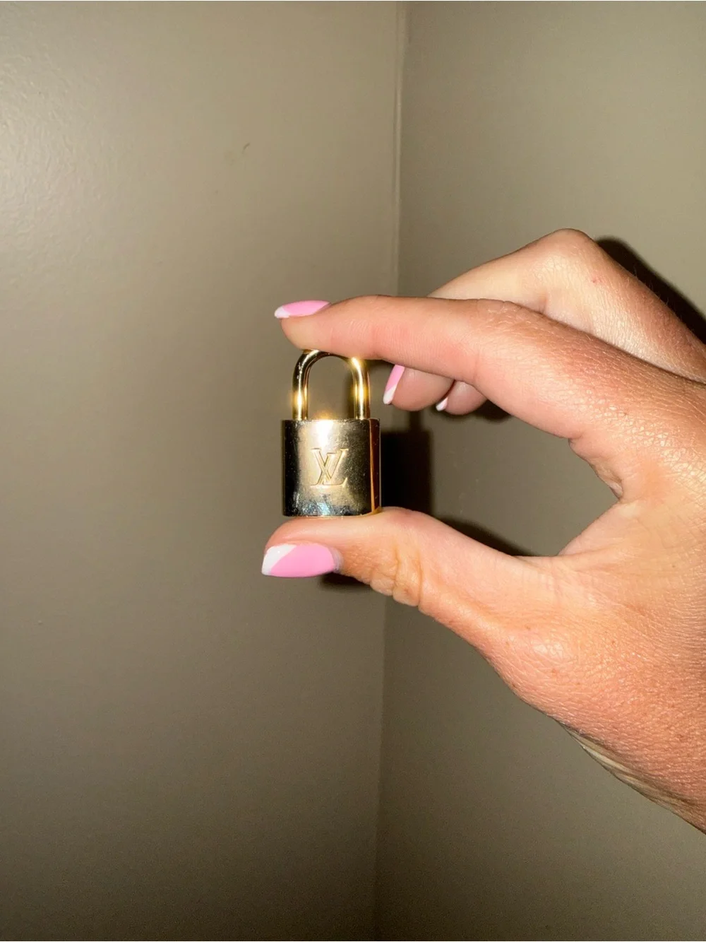 Louis Vuitton Gold Lock